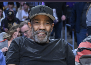 Denzel Washington detiene miradas al levantarse de su asiento a saludar a Lebron James