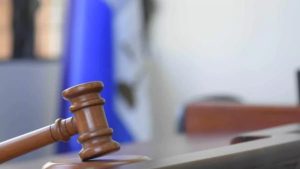 Tribunal pospone coerción a acusados de extorsionar desde Santiago